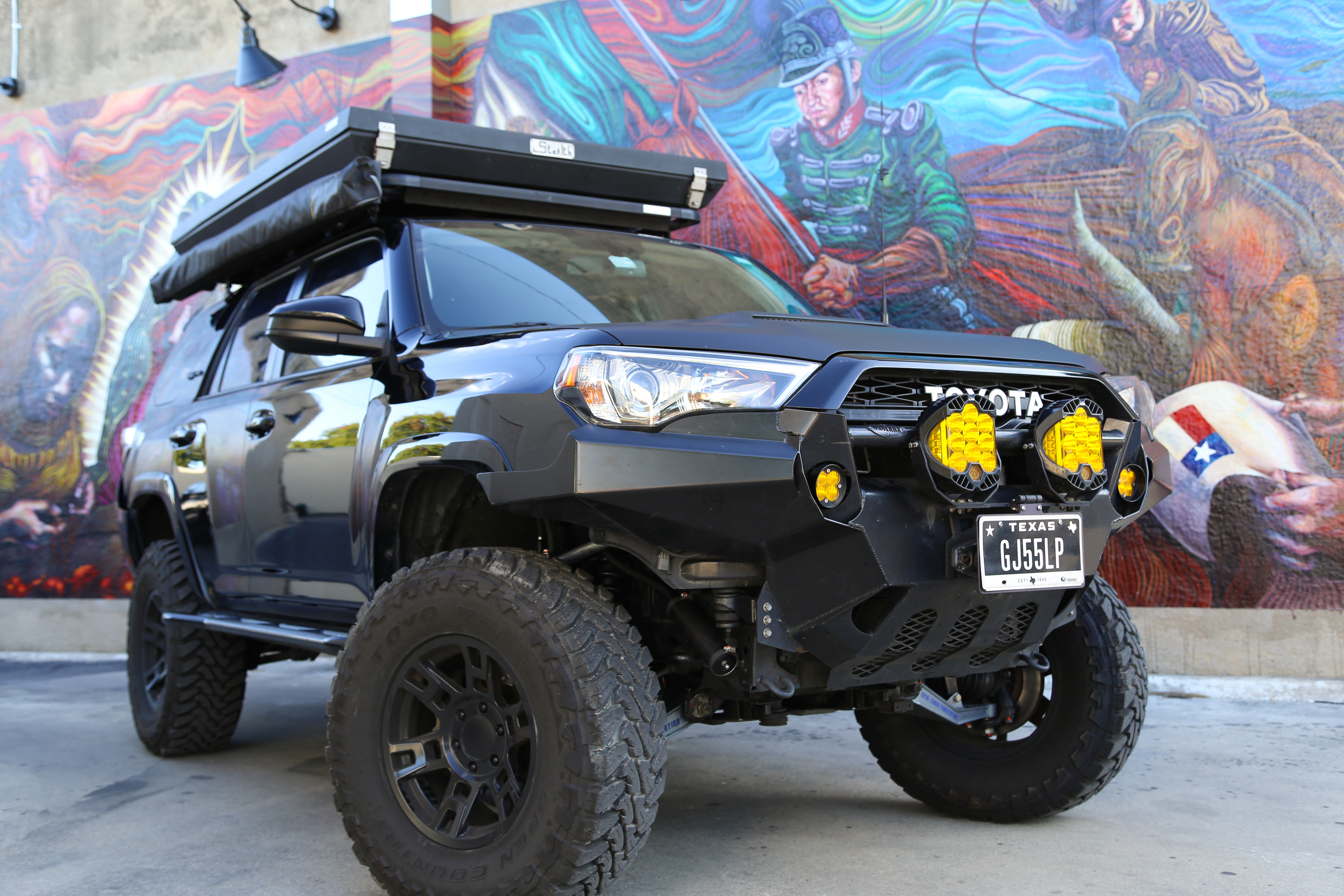 Lifted black Toyota 4Runner with custom wheels — Comal Truck Gear build