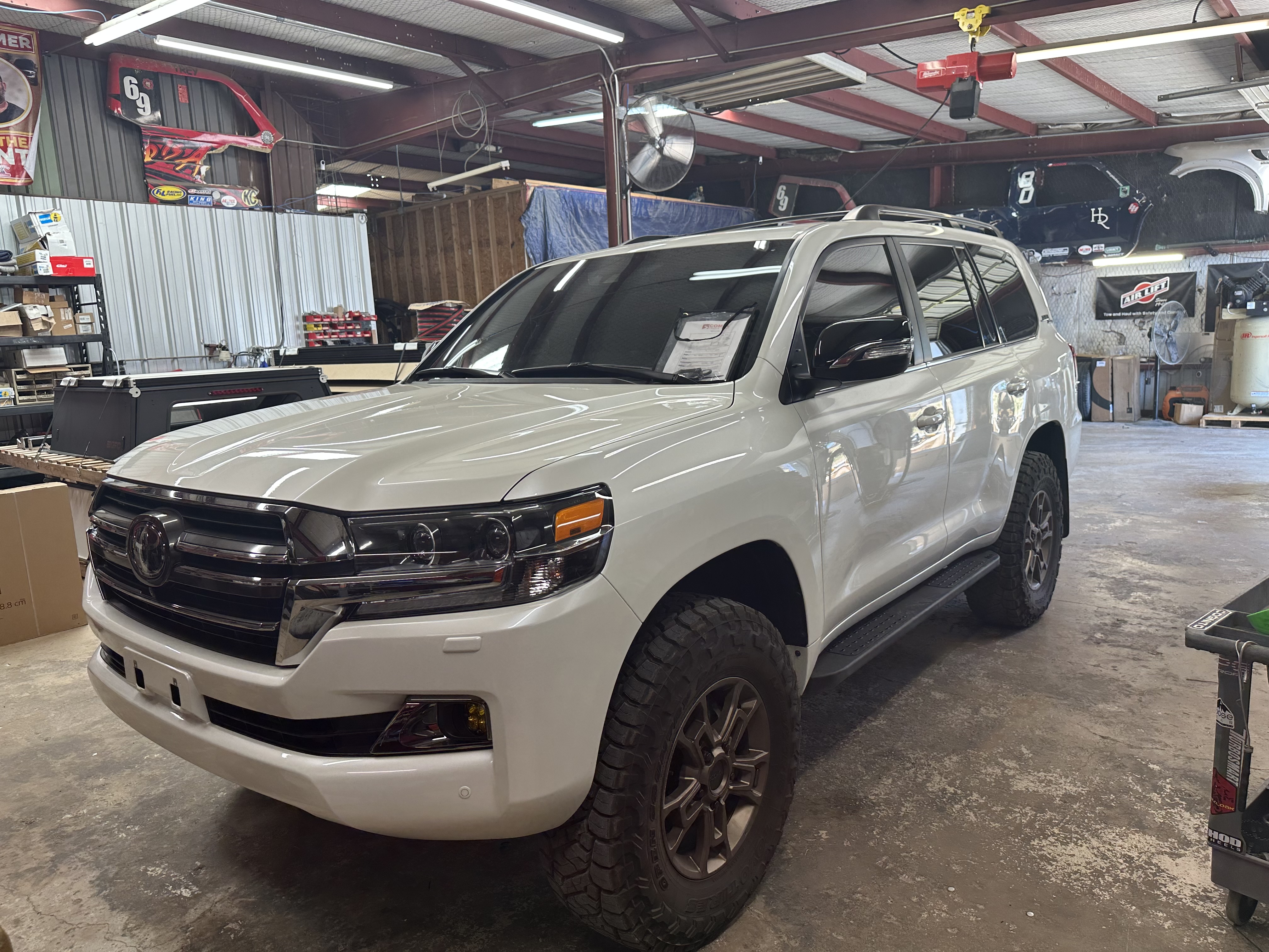 Truck in the Comal Truck Gear shop bay during build